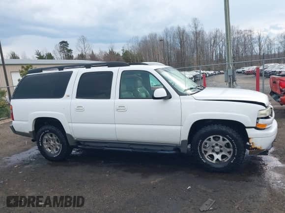 2002 Chevrolet Suburban Z71 z VIN 3GNFK16Z42G138355, wystawiony jako IAAI lot #41691463 z przebiegiem 207 255 mil mil oraz . Historia ofert i sprzedaży dostępna na DreamBid. Obrazek 13.