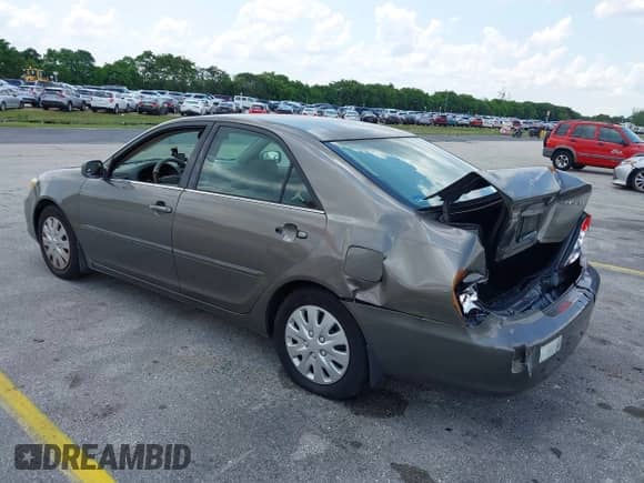 2002 Toyota Camry LE с VIN 4T1BE32K52U614396, выставлен на аукционе IAAI как лот 42345601 с пробегом 198 506 миль миль и . История ставок и продаж доступна на DreamBid. Изображение 3.