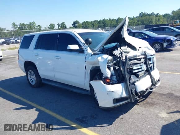 2015 Chevrolet Tahoe Commercial with VIN 1GNSK3ECXFR685336, listed as a IAAI auction lot 43053679 with 93,687 mi miles and . Bid and sale history available at DreamBid. Image 1.