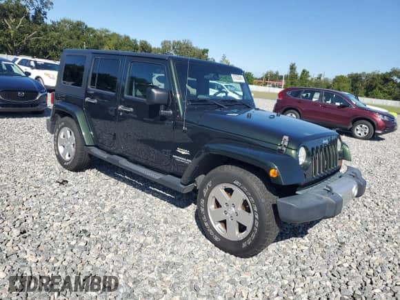 2010 Jeep Wrangler с VIN 1J4HB5H10AL126005, выставлен на аукционе Copart как лот 87035045 с пробегом 155 702 миль миль и Чистый • Clean title. История ставок и продаж доступна на DreamBid. Изображение 4.