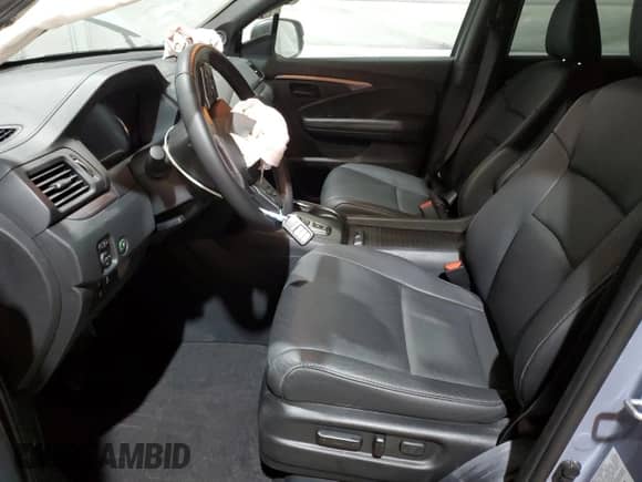 2023 Honda Passport EX-L с VIN 5FNYF8H56PB031149, выставлен на аукционе Copart как лот 66913305 с пробегом 21 205 миль миль и Списание • Salvage title. История ставок и продаж доступна на DreamBid. Изображение 7.