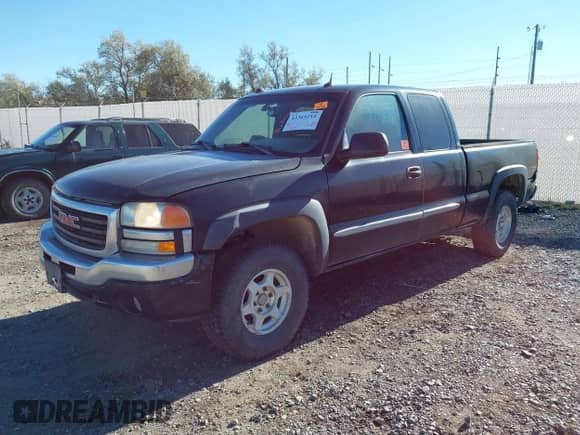 2004 GMC Sierra 1500 SLE z VIN 1GTEK19T34E266737, wystawiony jako IAAI lot #43369214 z przebiegiem 211 373 mil mil oraz . Historia ofert i sprzedaży dostępna na DreamBid. Obrazek 2.