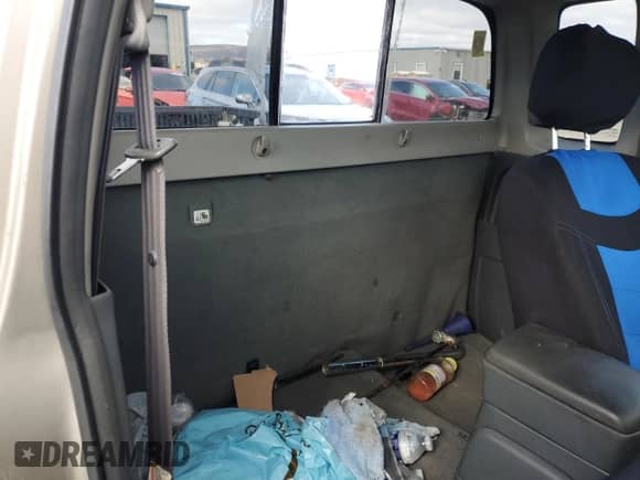 2003 Nissan Frontier XE z VIN 1N6ED26Y53C461858, wystawiony jako Copart lot #41445555 z przebiegiem Nie podano mil oraz Szkoda całkowita • Salvage title. Historia ofert i sprzedaży dostępna na DreamBid. Obrazek 10.