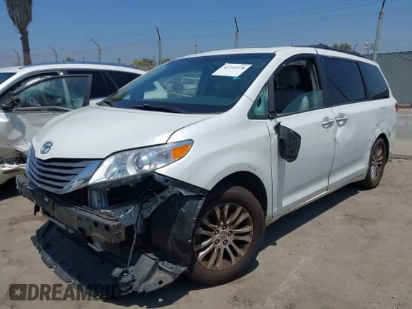 2015 Toyota Sienna XLE with VIN 5TDYK3DC8FS639719, listed as a IAAI auction lot 42753578 with 157,983 mi miles and . Bid and sale history available at DreamBid. Image 2.