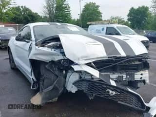 2021 Ford Mustang EcoBoost z VIN 1FA6P8TH7M5155309, wystawiony jako IAAI lot #42623775 z przebiegiem 42 860 mil mil oraz . Historia ofert i sprzedaży dostępna na DreamBid. Obrazek 1.