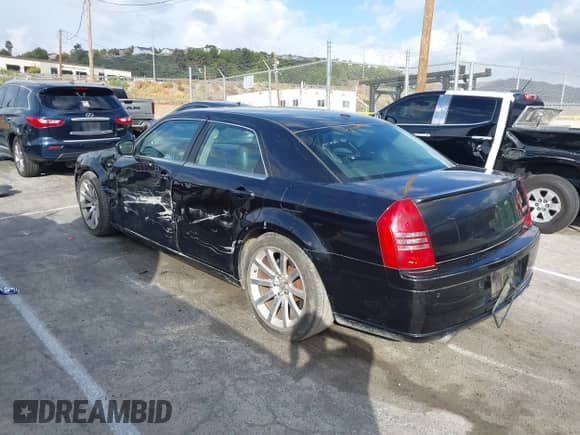 2007 Chrysler 300 C SRT-8 with VIN 2C3LA73W37H658358, listed as a IAAI auction lot 43439006 with 175,088 mi miles and . Bid and sale history available at DreamBid. Image 3.