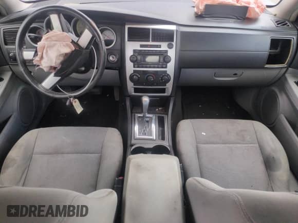 2007 Dodge Charger Police z VIN 2B3KA43G97H756049, wystawiony jako Copart lot #54934105 z przebiegiem 164 383 mil mil oraz Szkoda całkowita • Salvage title. Historia ofert i sprzedaży dostępna na DreamBid. Obrazek 8.