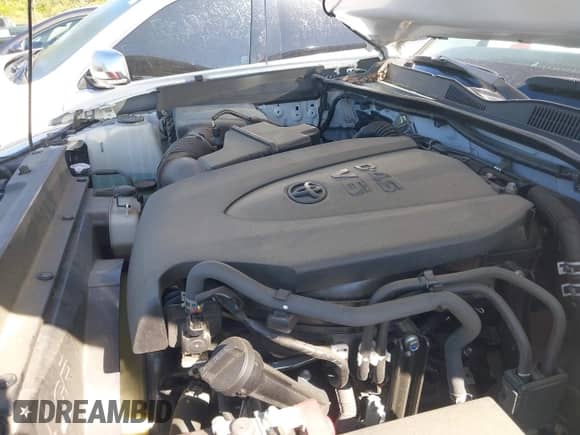 2021 Toyota Tacoma SR5 z VIN 3TYDZ5BN7MT003983, wystawiony jako IAAI lot #42052633 z przebiegiem 60 390 mil mil oraz . Historia ofert i sprzedaży dostępna na DreamBid. Obrazek 10.
