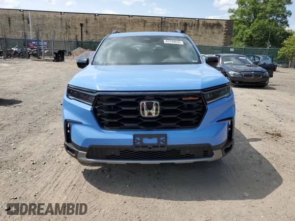 2025 Honda Pilot TrailSport with VIN 5FNYG1H60SB028186, listed as a Copart auction lot 67749635 with 11,752 mi miles and Salvage title. Bid and sale history available at DreamBid. Image 5.