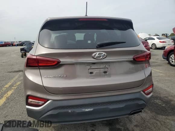 2019 Hyundai Santa Fe SE с VIN 5NMS23AD6KH029639, выставлен на аукционе Copart как лот 81923055 с пробегом 110 286 миль миль и Списание • Salvage title. История ставок и продаж доступна на DreamBid. Изображение 6.