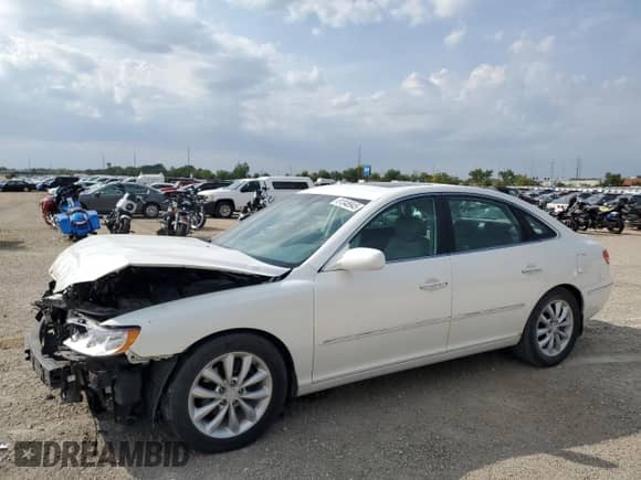 2007 Hyundai Azera SE z VIN KMHFC46F67A209859, wystawiony jako Copart lot #81348945 z przebiegiem 53 960 mil mil oraz Szkoda całkowita • Salvage title. Historia ofert i sprzedaży dostępna na DreamBid. Obrazek 1.