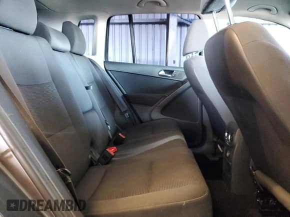 2013 Volkswagen Tiguan S z VIN WVGBV3AX5DW580870, wystawiony jako Copart lot #81127815 z przebiegiem 189 620 mil mil oraz Szkoda całkowita • Salvage title. Historia ofert i sprzedaży dostępna na DreamBid. Obrazek 11.