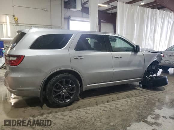 2016 Dodge Durango R/T with VIN 1C4SDJCT5GC341265, listed as a Copart auction lot 82257175 with 105,859 mi miles and Salvage title. Bid and sale history available at DreamBid. Image 3.