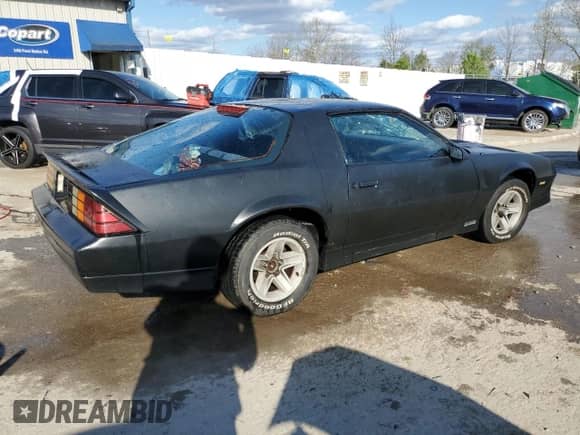 1986 Chevrolet Camaro Z28 Sport with VIN 1G1FP87H2GL105849, listed as a Copart auction lot 53272155 with 9,502 mi miles and Salvage title. Bid and sale history available at DreamBid. Image 3.