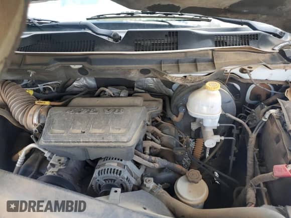 2012 Ram 1500 ST z VIN 3C6JD6DP4CG276742, wystawiony jako Copart lot #57086145 z przebiegiem 200 771 mil mil oraz Szkoda całkowita • Salvage title. Historia ofert i sprzedaży dostępna na DreamBid. Obrazek 11.