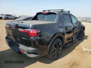 2023 Hyundai Santa Cruz Night Edition с VIN 5NTJCDAF2PH049592, выставлен на аукционе Copart как лот 63968604 с пробегом 13 430 миль миль и Списание • Salvage title. История ставок и продаж доступна на DreamBid. Изображение 3.