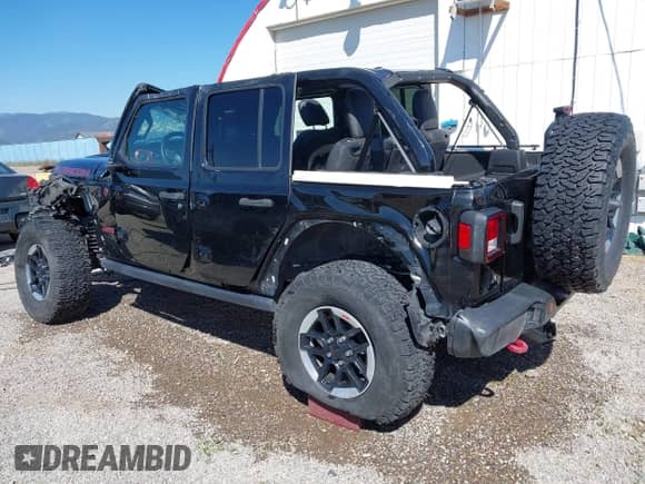 2021 Jeep Wrangler Unlimited Rubicon z VIN 1C4HJXFN0MW657900, wystawiony jako IAAI lot #42665653 z przebiegiem Nie podano mil oraz . Historia ofert i sprzedaży dostępna na DreamBid. Obrazek 3.