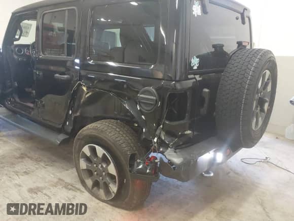 2022 Jeep Wrangler Unlimited Sahara with VIN 1C4HJXENXNW175227, listed as a IAAI auction lot 42043241 with 38,677 mi miles and . Bid and sale history available at DreamBid. Image 6.
