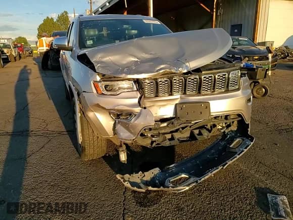 2017 Jeep Grand Cherokee Overland with VIN 1C4RJFCGXHC756588, listed as a Copart auction lot 84282675 with 101,960 mi miles and Salvage title. Bid and sale history available at DreamBid. Image 14.