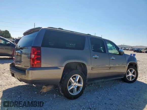2014 Chevrolet Suburban LT with VIN 1GNSCJE05ER175420, listed as a Copart auction lot 91117505 with 165,340 mi miles and Salvage title. Bid and sale history available at DreamBid. Image 3.