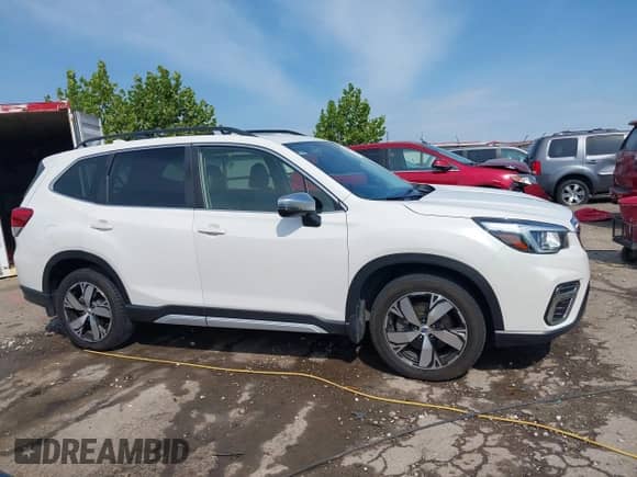 2020 Subaru Forester Touring with VIN JF2SKAXC3LH589349, listed as a IAAI auction lot 43154603 with 112,484 mi miles and . Bid and sale history available at DreamBid. Image 13.