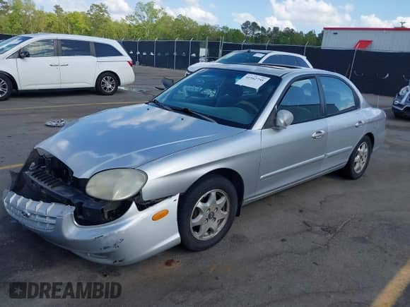 2000 Hyundai Sonata GLS z VIN KMHWF35V0YA303537, wystawiony jako IAAI lot #41942758 z przebiegiem 196 032 mil mil oraz . Historia ofert i sprzedaży dostępna na DreamBid. Obrazek 16.