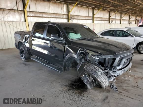 2020 Ram 1500 Rebel z VIN 1C6SRFLT0LN265734, wystawiony jako Copart lot #58668035 z przebiegiem 62 838 mil mil oraz Szkoda całkowita • Salvage title. Historia ofert i sprzedaży dostępna na DreamBid. Obrazek 4.