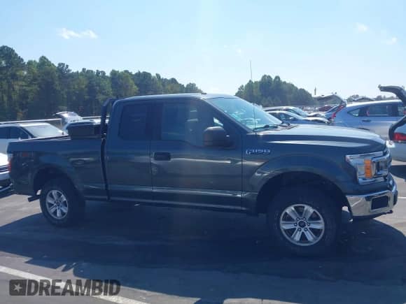 2018 Ford F-150 XLT z VIN 1FTEX1EP5JKD65356, wystawiony jako IAAI lot #43290503 z przebiegiem 75 709 mil mil oraz . Historia ofert i sprzedaży dostępna na DreamBid. Obrazek 13.