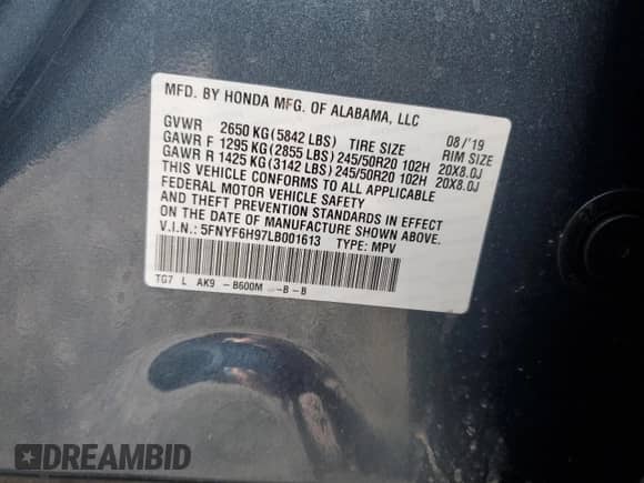 2020 Honda Pilot Touring 8-Passenger z VIN 5FNYF6H97LB001613, wystawiony jako Copart lot #72004285 z przebiegiem Nie podano mil oraz Szkoda całkowita • Salvage title. Historia ofert i sprzedaży dostępna na DreamBid. Obrazek 14.