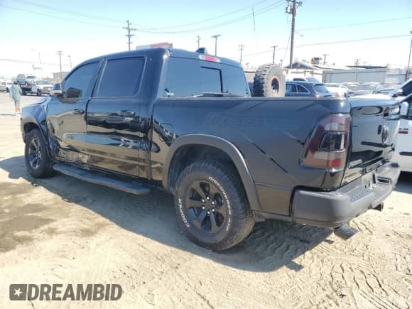 2020 Ram 1500 Rebel z VIN 1C6SRFLT0LN265734, wystawiony jako Copart lot #68314085 z przebiegiem 62 838 mil mil oraz Szkoda całkowita • Salvage title. Historia ofert i sprzedaży dostępna na DreamBid. Obrazek 2.
