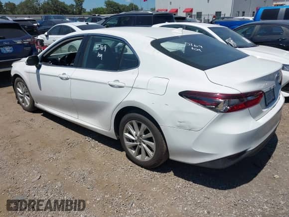 2022 Toyota Camry LE with VIN 4T1C11AK1NU015456, listed as a IAAI auction lot 42777442 with 97,365 mi miles and . Bid and sale history available at DreamBid. Image 3.