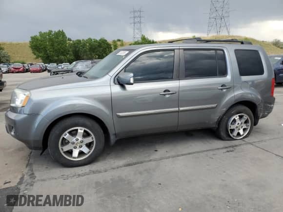 2009 Honda Pilot Touring with VIN 5FNYF48829B014693, listed as a Copart auction lot 65152355 with 160,961 mi miles and Salvage title. Bid and sale history available at DreamBid. Image 1.