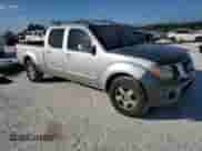 2008 Nissan Frontier SE z VIN 1N6AD09W98C422646, wystawiony jako Copart lot #86140644 z przebiegiem 198 294 mil mil oraz Szkoda całkowita • Salvage title. Historia ofert i sprzedaży dostępna na DreamBid. Obrazek 4.