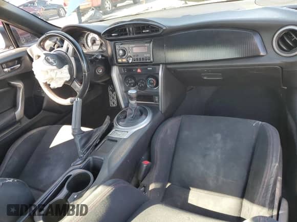 2013 Scion FR-S z VIN JF1ZNAA12D2725847, wystawiony jako Copart lot #86536935 z przebiegiem 151 146 mil mil oraz Szkoda całkowita • Salvage title. Historia ofert i sprzedaży dostępna na DreamBid. Obrazek 8.