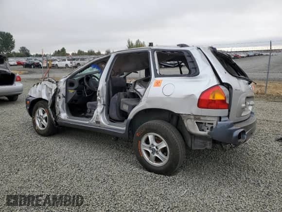 2003 Hyundai Santa Fe GLS с VIN KM8SC73D03U458797, выставлен на аукционе Copart как лот 69877294 с пробегом Не указан миль и Списание • Salvage title. История ставок и продаж доступна на DreamBid. Изображение 2.
