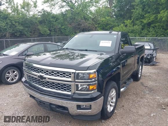 2015 Chevrolet Silverado 1500 LT z VIN 1GCNKREH6FZ355973, wystawiony jako IAAI lot #42359434 z przebiegiem 118 325 mil mil oraz . Historia ofert i sprzedaży dostępna na DreamBid. Obrazek 22.