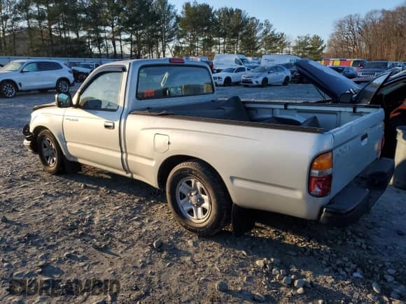 2003 Toyota Tacoma with VIN 5TENL42NX3Z150327, listed as a Copart auction lot 41579785 with 187,714 mi miles and Salvage title. Bid and sale history available at DreamBid. Image 2.