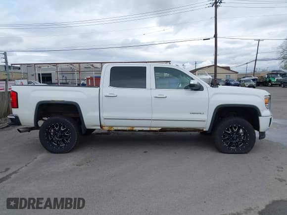 2014 GMC Sierra 1500 Denali z VIN 3GTU2WEJ8EG553336, wystawiony jako IAAI lot #43521471 z przebiegiem 177 785 mil mil oraz . Historia ofert i sprzedaży dostępna na DreamBid. Obrazek 13.