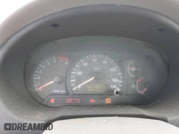 2002 Hyundai Accent GL z VIN KMHCG45C12U398748, wystawiony jako Copart lot #82077055 z przebiegiem 175 456 mil mil oraz Czysty tytuł • Clean title. Historia ofert i sprzedaży dostępna na DreamBid. Obrazek 9.