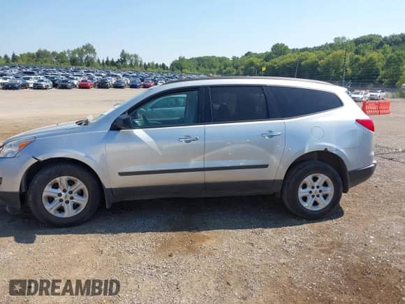 2011 Chevrolet Traverse LS with VIN 1GNKVFED1BJ320618, listed as a IAAI auction lot 42998569 with 125,898 mi miles and . Bid and sale history available at DreamBid. Image 14.