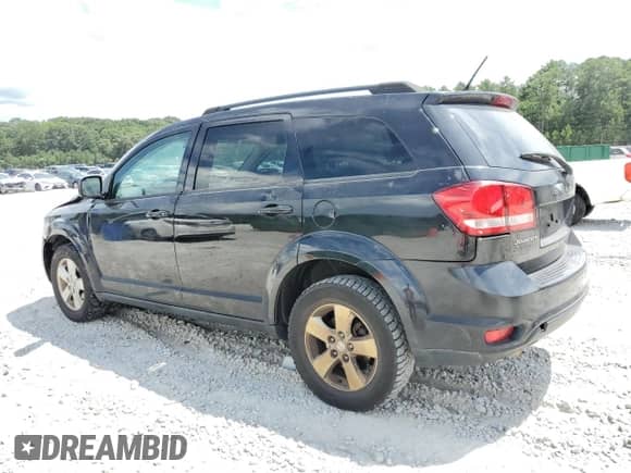 2012 Dodge Journey SXT z VIN 3C4PDCBG4CT135004, wystawiony jako Copart lot #68670485 z przebiegiem 202 652 mil mil oraz Szkoda całkowita • Salvage title. Historia ofert i sprzedaży dostępna na DreamBid. Obrazek 2.