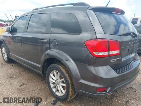2017 Dodge Journey SXT with VIN 3C4PDDBG8HT591844, listed as a IAAI auction lot 42774893 with 198,419 mi miles and . Bid and sale history available at DreamBid. Image 3.