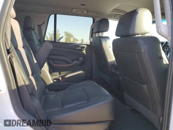 2019 Chevrolet Tahoe Premier z VIN 1GNSCCKC6KR215753, wystawiony jako Copart lot #77375734 z przebiegiem 77 523 mil mil oraz Szkoda całkowita • Salvage title. Historia ofert i sprzedaży dostępna na DreamBid. Obrazek 11.