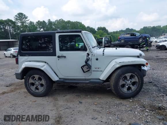 2016 Jeep Wrangler Sahara with VIN 1C4AJWBG8GL111158, listed as a IAAI auction lot 42602359 with Not provided miles and . Bid and sale history available at DreamBid. Image 13.