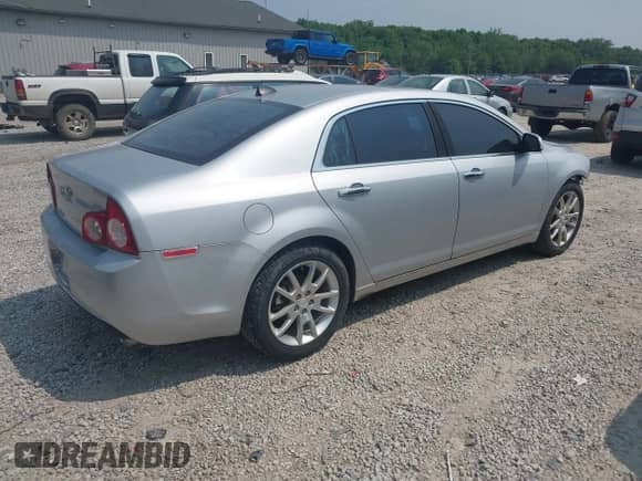 2012 Chevrolet Malibu LTZ z VIN 1G1ZG5E79CF205302, wystawiony jako IAAI lot #42416939 z przebiegiem 186 716 mil mil oraz . Historia ofert i sprzedaży dostępna na DreamBid. Obrazek 4.