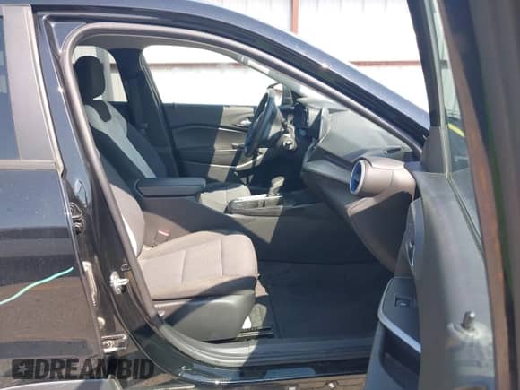 2024 Chevrolet Trax LS with VIN KL77LFE21RC025677, listed as a IAAI auction lot 42906504 with 53,679 mi miles and . Bid and sale history available at DreamBid. Image 5.