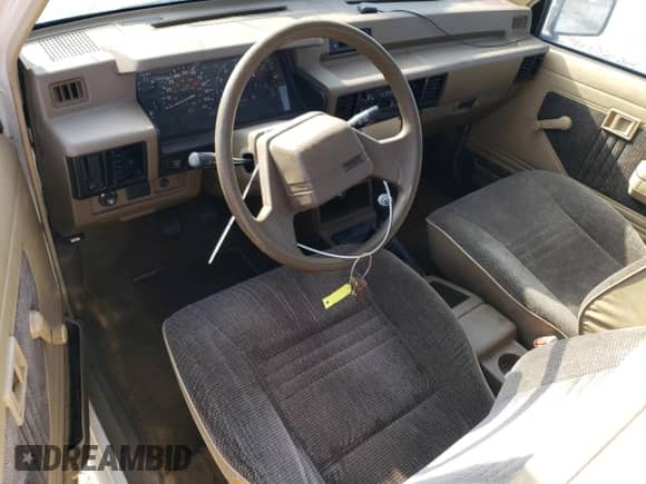 1989 Dodge RAM with VIN JB7FL55E0KP006393, listed as a Copart auction lot 82760774 with 148,071 mi miles and Clean title. Bid and sale history available at DreamBid. Image 8.
