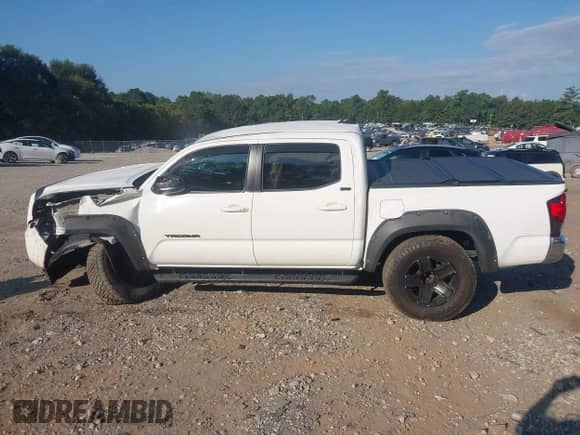 2021 Toyota Tacoma SR5 with VIN 3TMAZ5CN8MM152710, listed as a IAAI auction lot 43148239 with 40,000 mi miles and . Bid and sale history available at DreamBid. Image 14.
