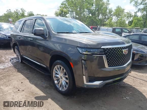 2021 Cadillac Escalade Premium Luxury with VIN 1GYS4CKL6MR264678, listed as a IAAI auction lot 42470069 with 26,611 mi miles and . Bid and sale history available at DreamBid. Image 1.