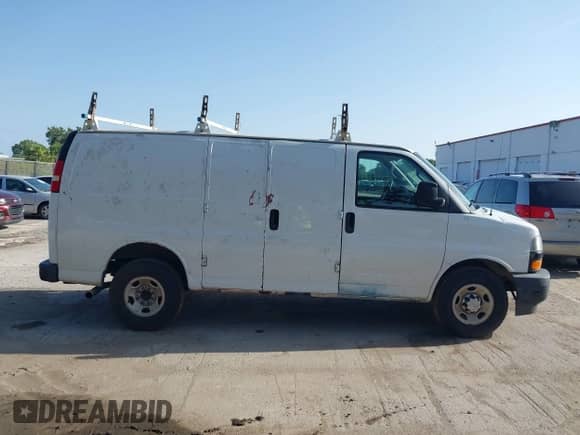 2018 Chevrolet Express Cargo with VIN 1GCWGAFP5J1221010, listed as a IAAI auction lot 42834960 with 186,402 mi miles and . Bid and sale history available at DreamBid. Image 13.
